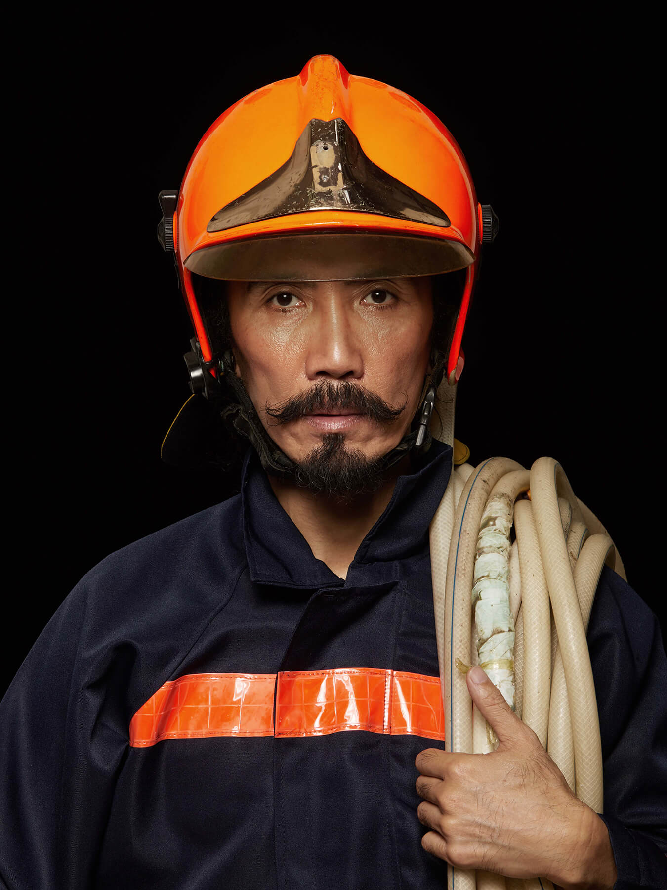 16 Oct 2017 A Salute to firefighters: Derong is photographed as a firefighter